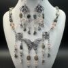 Bullets and Butterflies Necklace and Earrings Set